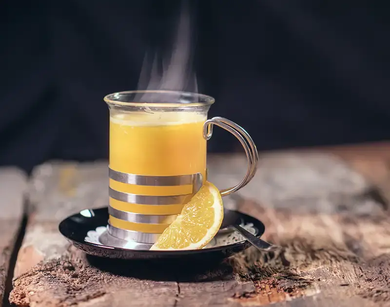 Glass with hot lemon